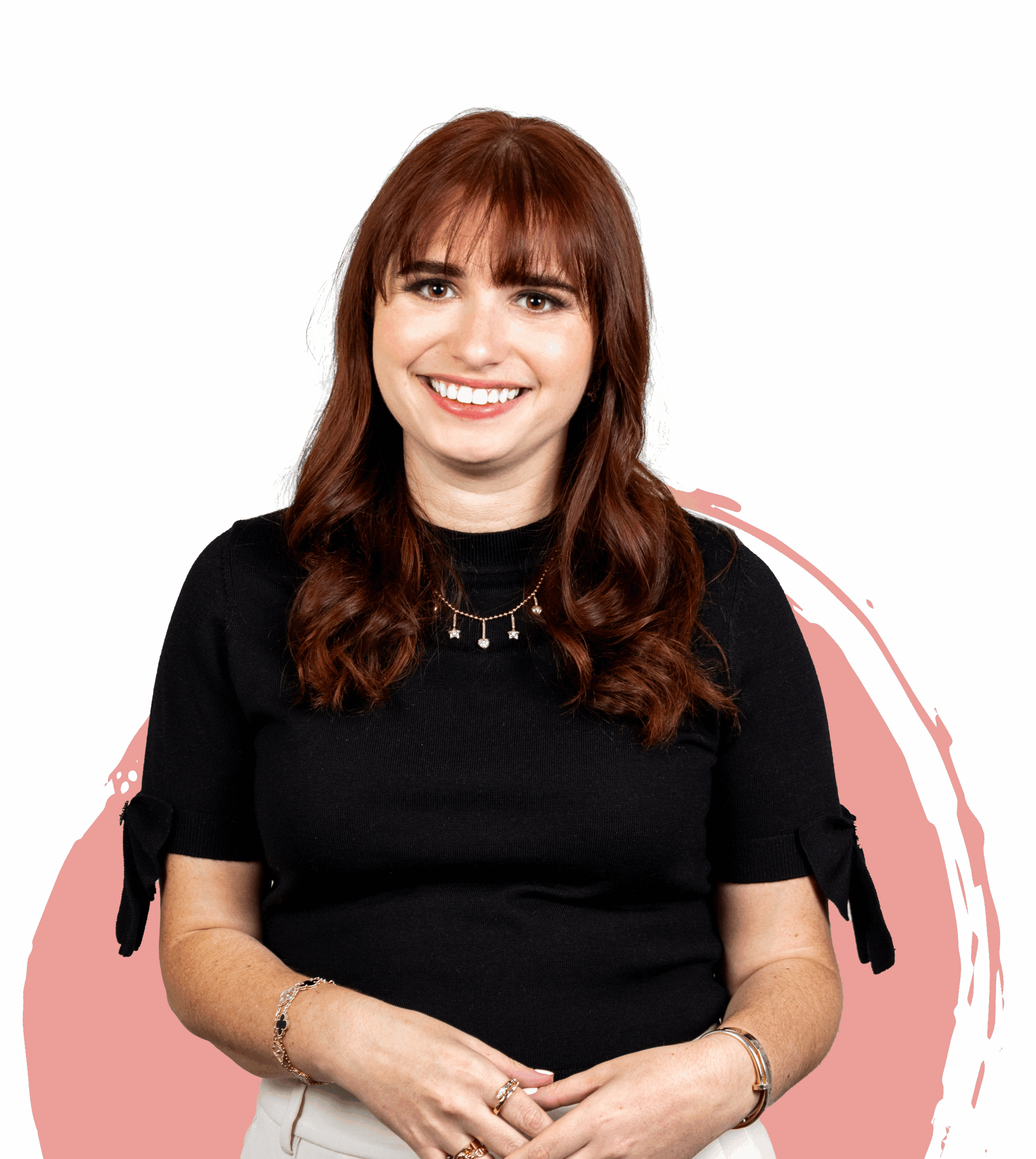 Haley Smiling in Black Shirt In Front of Pink Shape